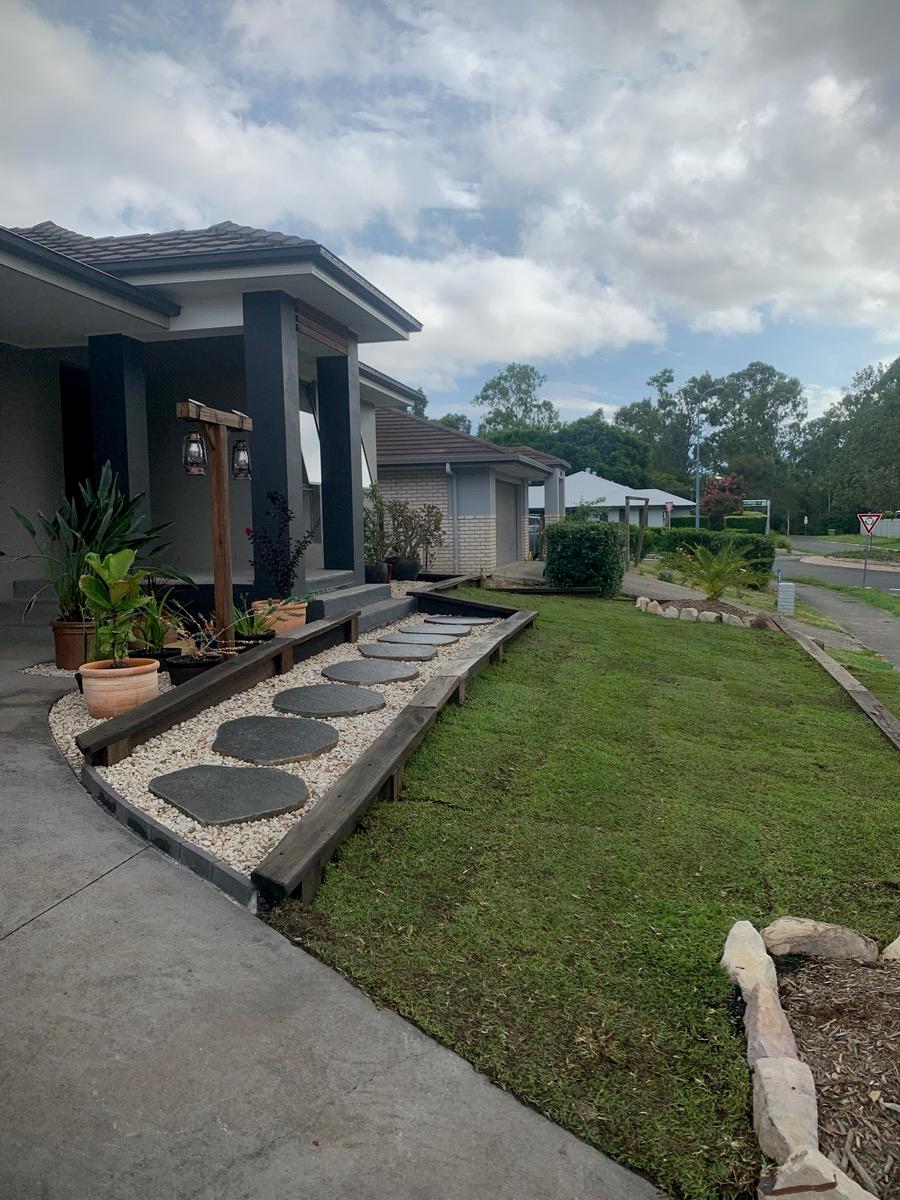 Front yard lawn with a stepping stone path